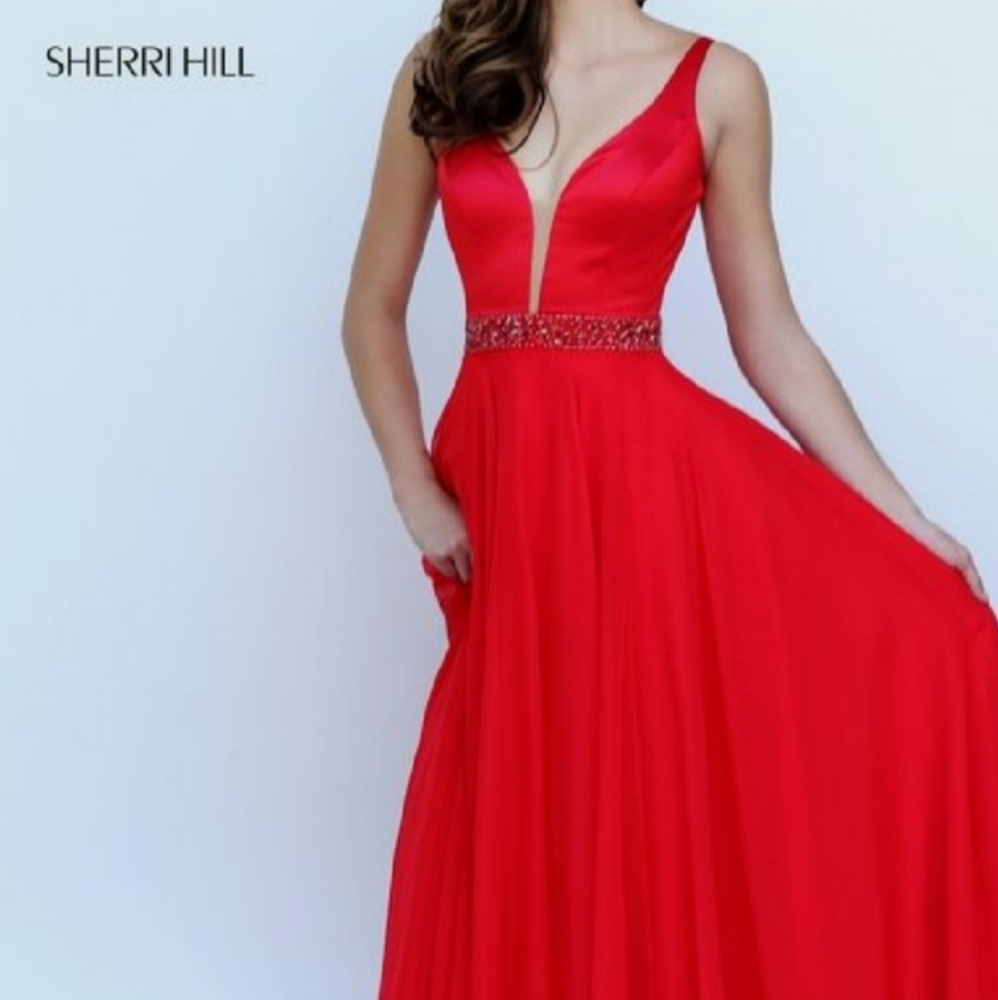 Sherri Hill size 2 White dress with deep v neck